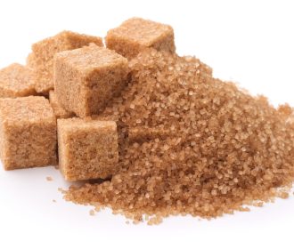 Pile,Of,Brown,Granulated,Sugar,And,Sugar,Cubes,Isolated,On